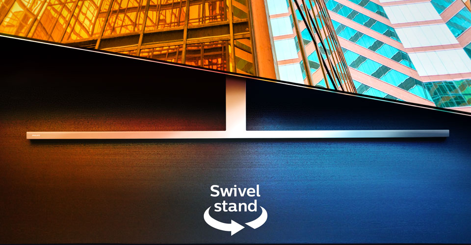 Philips Ambilight televizors uz grozāma statīva, uz kura attēlotas divas krāsainas arhitektūras ainas ar bultiņu un tekstu, kas norāda uz grozāmības funkciju